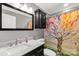 Updated bathroom featuring a modern vanity, colorful shower curtain and a framed mirror at 6115 Campbell Rd, York, SC 29745