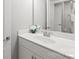 Bright, stylish bathroom featuring vanity with white countertop, sink, and ample storage at 6320 Tilley Way, Matthews, NC 28105