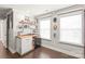 Office space featuring a built in desk, hardwood floors, and decorative Star Wars collectibles at 6320 Tilley Way, Matthews, NC 28105