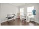 Bright, functional office space featuring hardwood floors and two large windows at 6320 Tilley Way, Matthews, NC 28105