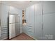 Well-organized pantry with ample storage, built-in shelving, and modern finishes to keep everything tidy at 6320 Tilley Way, Matthews, NC 28105