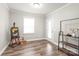 Versatile room with wood floors, natural light, easel, and decor at 6320 Tilley Way, Matthews, NC 28105