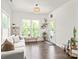 Cozy sitting area with natural light, stylish decor, and a serene view of the outdoors at 6320 Tilley Way, Matthews, NC 28105