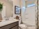 Bright bathroom featuring a shower-tub combo, elegant vanity, and stylish decor at 6388 Fairfax Ct, Maiden, NC 28650