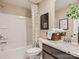 Beautiful bathroom features a shower-tub combo, elegant vanity, and stylish decor at 6388 Fairfax Ct, Maiden, NC 28650