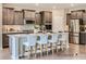 Modern kitchen with stainless steel appliances, a spacious island with seating, and plenty of cabinet space at 6388 Fairfax Ct, Maiden, NC 28650