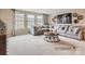 Bright and airy living room with large windows and modern decor for comfortable living at 6388 Fairfax Ct, Maiden, NC 28650