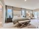 Spacious main bedroom with neutral walls, carpet, a king-size bed, and large windows providing natural light at 6388 Fairfax Ct, Maiden, NC 28650