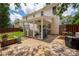 View of the backyard with the covered patio attached to the house at 6422 Gatesville Ln, Charlotte, NC 28270
