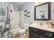 Bathroom with a shower tub combination and a vanity sink at 6422 Gatesville Ln, Charlotte, NC 28270