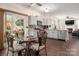 Bright eat-in kitchen featuring stainless appliances and outdoor access at 6422 Gatesville Ln, Charlotte, NC 28270