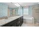 Bathroom with double sink vanity, granite countertops, tub, and shower at 809 Ayrshire Ave, Fort Mill, SC 29708