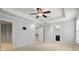 Bedroom with tray ceiling, recessed lighting, ceiling fan, and en suite bathroom at 809 Ayrshire Ave, Fort Mill, SC 29708