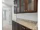 Butler's pantry with granite countertops and upper cabinets at 809 Ayrshire Ave, Fort Mill, SC 29708