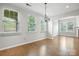 Sunny dining room with natural light and hardwood flooring at 809 Ayrshire Ave, Fort Mill, SC 29708