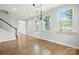 Bright dining room featuring large windows and hardwood floors at 809 Ayrshire Ave, Fort Mill, SC 29708