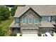 Charming home featuring a stone facade, attached garage, and well-maintained landscaping at 809 Ayrshire Ave, Fort Mill, SC 29708