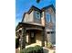 Charming two-story home with stone accents, arched entryway, and attached garage at 809 Ayrshire Ave, Fort Mill, SC 29708