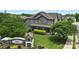 Exterior view of a multi-story home with stone and siding and lush landscaping at 809 Ayrshire Ave, Fort Mill, SC 29708