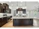 Spacious kitchen with granite countertops, stainless steel appliances, and a large island at 809 Ayrshire Ave, Fort Mill, SC 29708