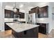 Lovely kitchen featuring granite countertops, stainless steel appliances, and an island with pendant lighting at 809 Ayrshire Ave, Fort Mill, SC 29708
