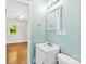 Light green bathroom with a view into the connected bedroom at 814 W Gold St, Kings Mountain, NC 28086