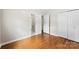 Bedroom with hardwood floors, two closets and a doorway to another room at 814 W Gold St, Kings Mountain, NC 28086