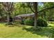Charming brick ranch-style home surrounded by lush greenery at 814 W Gold St, Kings Mountain, NC 28086