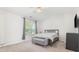 Bedroom with neutral carpet, gray furniture, and a ceiling fan at 9720 Walkers Glen Nw Dr, Concord, NC 28027