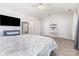 Spacious bedroom features a fireplace, tv, and multiple closets at 9720 Walkers Glen Nw Dr, Concord, NC 28027