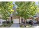 Charming brick townhome with a one car garage and well maintained landscaping at 9720 Walkers Glen Nw Dr, Concord, NC 28027