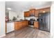 Well-equipped kitchen with stainless steel appliances, ample cabinet space, and hardwood floors at 9720 Walkers Glen Nw Dr, Concord, NC 28027