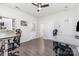 Office space features wood-look flooring and multiple desks for versatile use at 9720 Walkers Glen Nw Dr, Concord, NC 28027