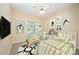 Bright bedroom with two twin beds, playful decor, and ample space, ideal for a comfort and imagination at 975 Pine Knoll Rd, Fort Mill, SC 29715