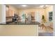 Well-lit kitchen featuring granite countertops, stainless steel appliances, and access to the breakfast area, offering modern convenience at 975 Pine Knoll Rd, Fort Mill, SC 29715