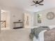 Bedroom with carpet, a ceiling fan, and a table with decor at 10333 Scott Gate Ct, Charlotte, NC 28277