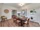 Dining room with a wooden table, stylish decor, and access to the living areas at 104 W Maryland Ave, Bessemer City, NC 28016