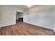 Spacious living room with hardwood floors connecting to other areas of the home at 104 W Maryland Ave, Bessemer City, NC 28016