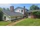 Exterior backyard view of a two story house featuring brick and white painted exteriors at 11056 Us Highway 52 N Hwy, Wadesboro, NC 28170