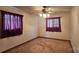 Bedroom with carpet flooring and dual windows at 11056 Us Highway 52 N Hwy, Wadesboro, NC 28170