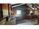 Rustic kitchen featuring wood cabinets, laminate countertops, and vintage appliances at 11056 Us Highway 52 N Hwy, Wadesboro, NC 28170