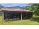 The yard includes an open-air barn shed, perfect for equipment and storage at 11056 Us Highway 52 N Hwy, Wadesboro, NC 28170