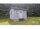 Charming exterior of a shed with a classic door and simple window design set against a verdant backdrop at 11056 Us Highway 52 N Hwy, Wadesboro, NC 28170