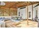 Inviting covered deck area perfect for dining and relaxation with stylish furniture at 111 Painted Bunting Dr, Troutman, NC 28166