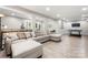 Spacious finished basement with a large sectional sofa, ping pong table, and ample recessed lighting at 1125 Victoria Blake Ln, Belmont, NC 28012