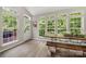 Bright breakfast nook with large windows offering great natural light, and access to the back deck at 1125 Victoria Blake Ln, Belmont, NC 28012
