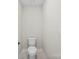 Simple toilet with marble floor at 1227 Breezewood Dr, Charlotte, NC 28262