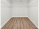 Spacious walk-in closet with ample storage space and custom shelving, ideal for organization at 1227 Breezewood Dr, Charlotte, NC 28262