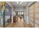 Inviting foyer with hardwood floors, neutral paint, and views into the living spaces at 125 Snow Fountain Ln, Mooresville, NC 28115