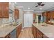 Modern kitchen featuring granite countertops, stainless steel appliances and wood floors at 125 Snow Fountain Ln, Mooresville, NC 28115
